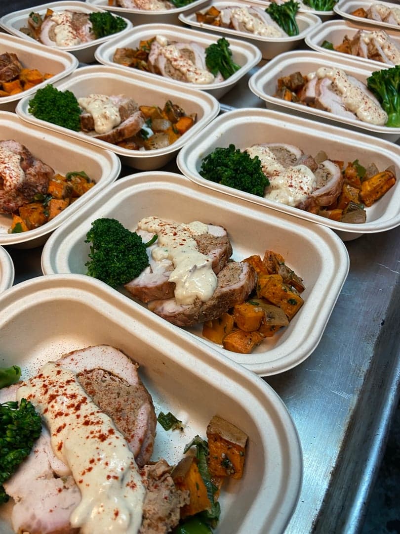 Herb-roasted turkey with sweet potato and broccoli, chef-prepared